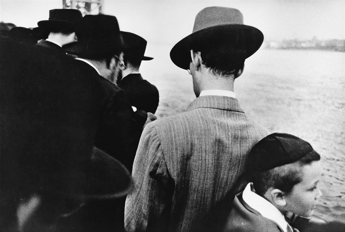 ROBERT FRANK (1924- ) Yom Kippur, East River, New York City.